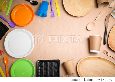 Flat lay composition with plastic, paper and wooden utensil on beige background, space for text. Recycling concept Flat lay composition with plastic, paper and wooden utensil on beige background, space for text. Recycling concept 93162289