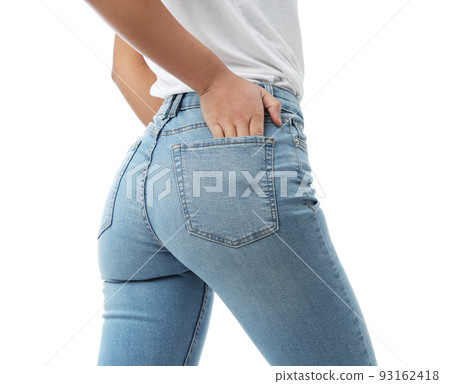 Woman wearing jeans on white background, closeup Woman wearing jeans on white background, closeup 93162418
