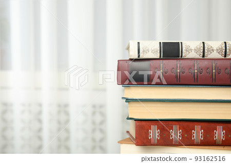 Collection of different books indoors. Space for text 93162516