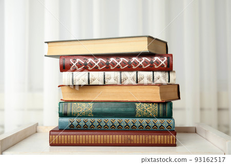 Collection of different books on table indoors 93162517