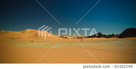 Landscape of sand dune and sandstone nature sculpture at Tamezguida in Tassili nAjjer national park, Algeria Landscape of sand dune and sandstone nature sculpture at Tamezguida in Tassili nAjjer national park, Algeria 93162594