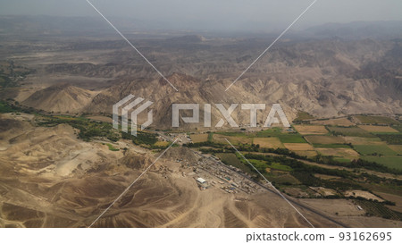 Aerial airplane panoramic view to Nazca plateau with geoglyph lines , Ica, Peru 93162695