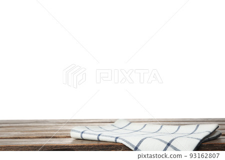 Folded kitchen towel on wooden table. Space for design Folded kitchen towel on wooden table. Space for design 93162807