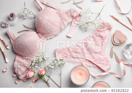 Composition with elegant women's underwear on light background, flat lay 93162822