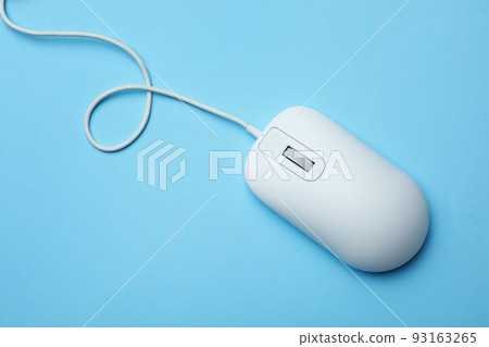 Wired computer mouse on light blue background, top view Wired computer mouse on light blue background, top view 93163265