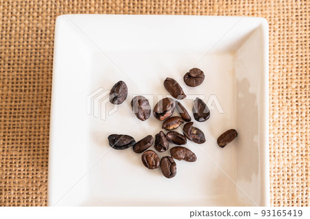 Sorted and removed coffee beans Sorted and removed coffee beans 93165419