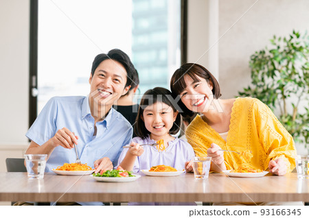 Young family eating at a family restaurant Young family eating at a family restaurant 93166345