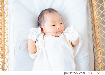 Baby in a cradle Newborn 15 days after birth 93166543