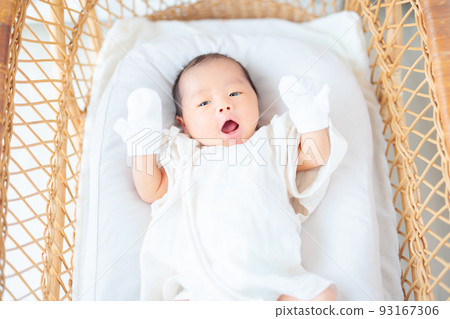 Cute baby wearing baby mittens 15 days old newborn Cute baby wearing baby mittens 15 days old newborn 93167306