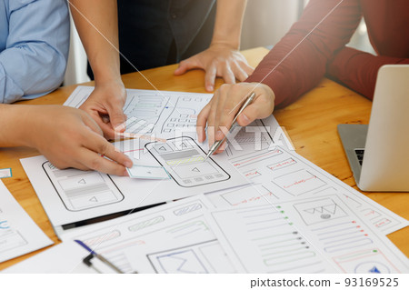 UX UI Concept, Graphic designers work together with UX UI designer planning application template layout framework for mobile phone computer mobile 93169525