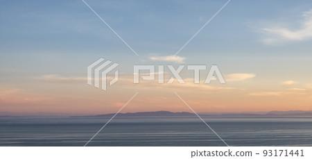 Panoramic View of Cloudscape during a colorful sunset or sunrise. Panoramic View of Cloudscape during a colorful sunset or sunrise. 93171441