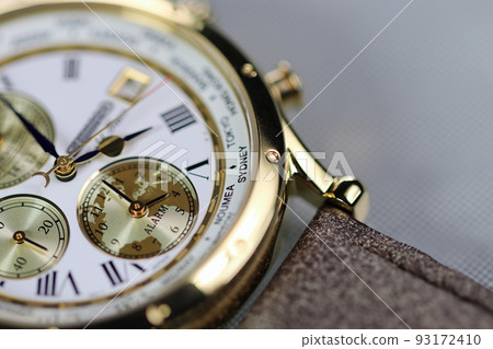 close up shallow focus Time zone cities code on luxury world time watch bezel on Sydney, Neumea, Tokyo. 93172410