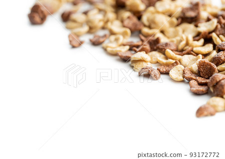 Breakfast cereal flakes isolated on white background. Breakfast cereal flakes isolated on white background. 93172772