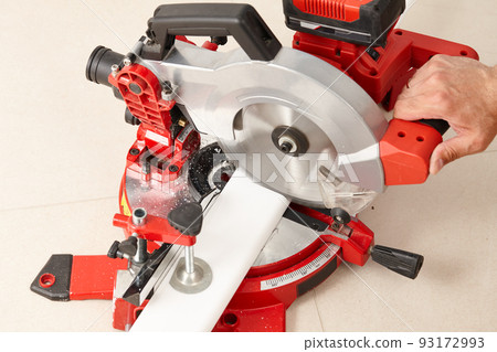 Skirting board cutting with a professional chop saw tool 93172993