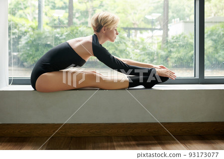 Dancer Doing Forward Fold 93173077