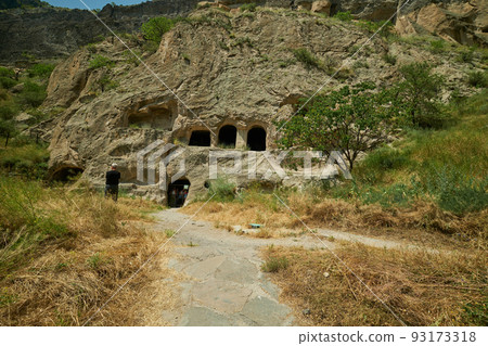 Vardzia cave monastery site in southern Georgia excavated from the slopes of the Erusheti Mountain on the left bank of the Kura River daylight view 93173318