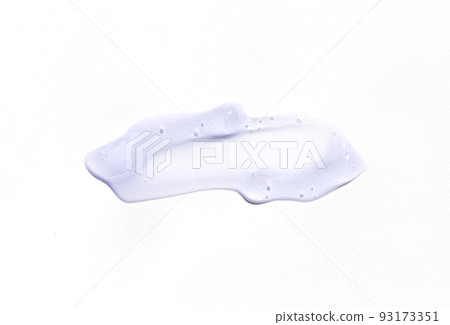 Violet cosmetics smear or antiseptic gel, cleaner, serum drop isolated on white background. Colorful slime with air bubbles in the sunlight. High contrast trendy photo. Health protection concept 93173351
