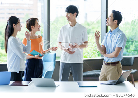 Casual business people chatting in the office 93174546