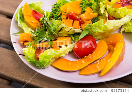 Image of salad with baked pumpkin. 93175154