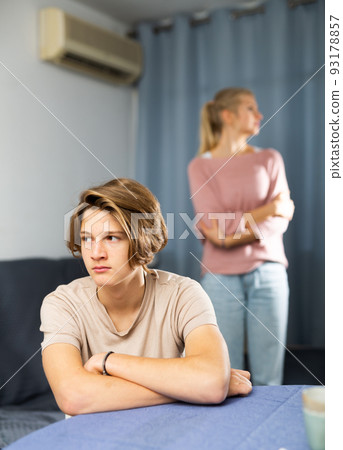 Portrait of unhappy son after discord with mother 93178857