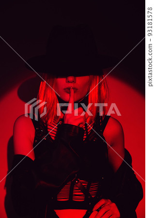 sexy fashion girl in a belt, leather raincoat and hat sexy fashion girl in a belt, leather raincoat and hat 93181578