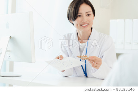 healthcare worker handing medicine healthcare worker handing medicine 93183146