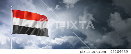 Yemen flag on a cloudy sky Yemen flag on a cloudy sky 93184489