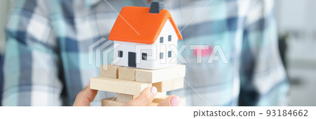 Real estate insurance and safe house construction closeup Real estate insurance and safe house construction closeup 93184662