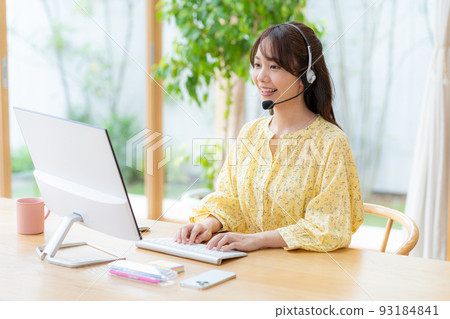 Young woman taking classes remotely Young woman taking classes remotely 93184841