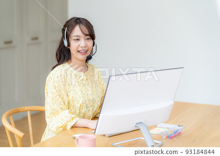 Young woman taking classes remotely Young woman taking classes remotely 93184844