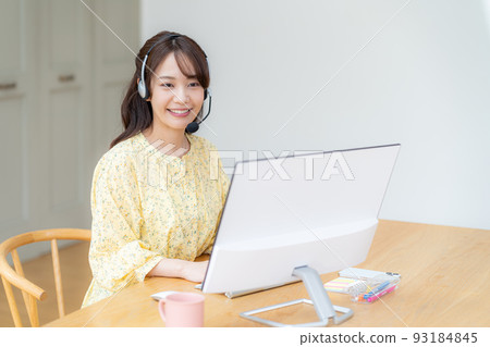 Young woman taking classes remotely Young woman taking classes remotely 93184845
