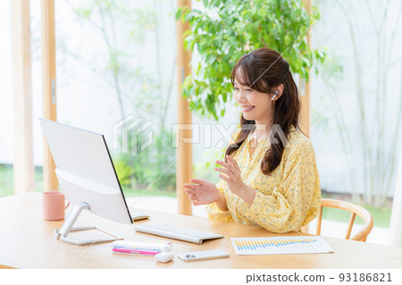 Web conferencing young woman 93186821
