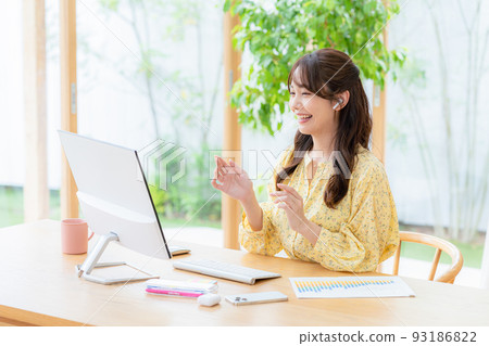 Web conferencing young woman 93186822