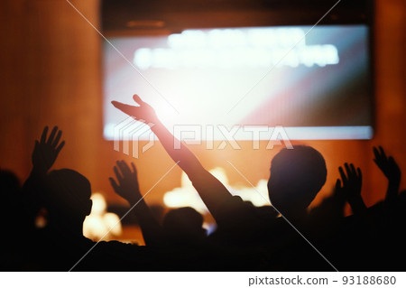 Passionate worship with hands raised and praising and graceful church prayer time background Passionate worship with hands raised and praising and graceful church prayer time background 93188680