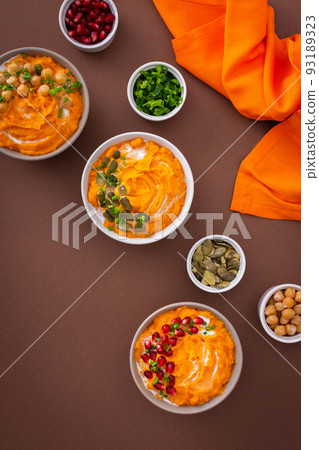 Pumpkin puree of butternut squash in bowls 93189323