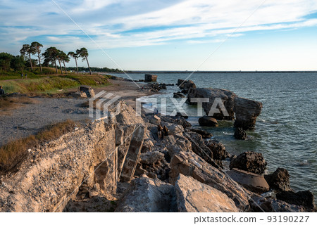 Ruins of bunkers on the beach of the Baltic sea, part of an old fort 93190227