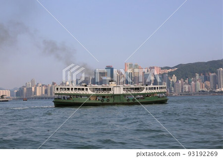 Star ferry sailing through Victoria Bay in Hong Kong 93192269
