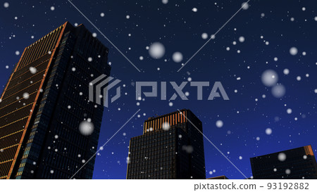 Snow falling in the office district at night 93192882
