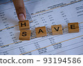 hand put word H replace for meaning of Have and Save. concept of money debt management. 93194586