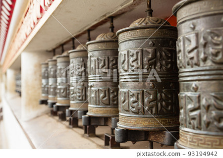 Mani car along the mountain road to Swayambhunath Temple in Kathmandu, Nepal Mani car along the mountain road to Swayambhunath Temple in Kathmandu, Nepal 93194942