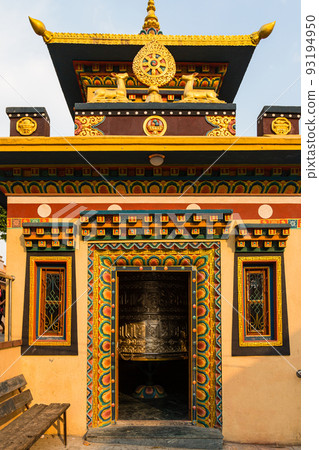 Prayer wheel in a temple along the mountain road to Swayambhunath Temple in Kathmandu, Nepal Prayer wheel in a temple along the mountain road to Swayambhunath Temple in Kathmandu, Nepal 93194950