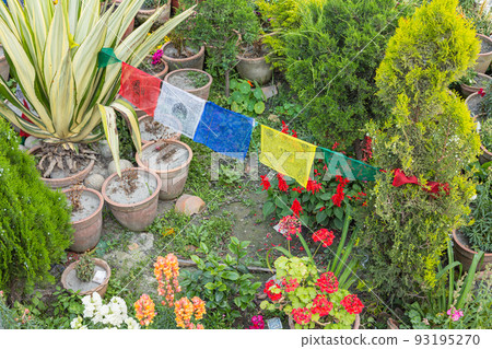 Flowers and talchos decorated around Boudhanath, Nepal's largest stupa in Kathmandu, Nepal 93195270