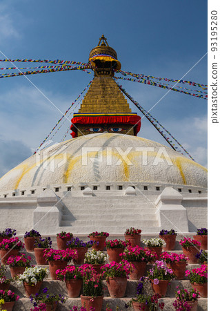 Boudhanath and Thalcho, Nepal's largest stupas in Kathmandu, Nepal, and flowers decorated around them Boudhanath and Thalcho, Nepal's largest stupas in Kathmandu, Nepal, and flowers decorated around them 93195280