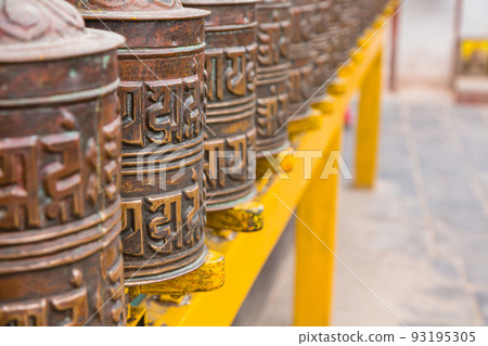 Prayer wheels around Boudhanath, Nepal's largest stupa in Kathmandu, Nepal Prayer wheels around Boudhanath, Nepal's largest stupa in Kathmandu, Nepal 93195305