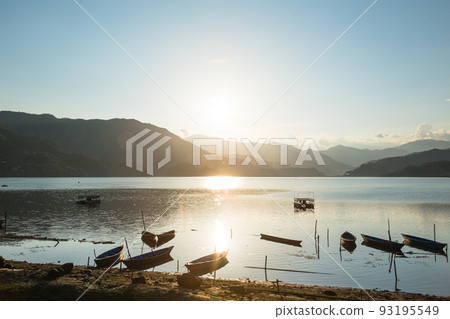 Phewa lake scenery, mountains and sunset from the lakeside of Pokhara, Nepal 93195549