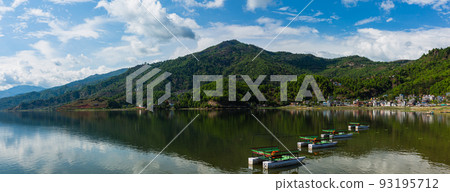 Phewa lake scenery and boats floating on the lake from the lakeside of Pokhara, Nepal 93195712