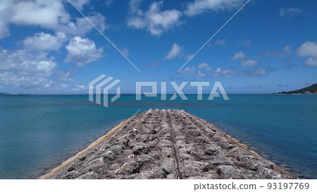 Blue sea, sunny sky, white clouds, embankment of tropical Okinawa Blue sea, sunny sky, white clouds, embankment of tropical Okinawa 93197769