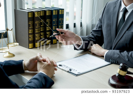 Lawyer hand holding pen and providing legal consult business dispute to the man 93197923