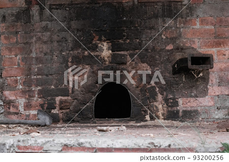 Oven used to heat pails in the artisanal process of making panela made with sugar cane Oven used to heat pails in the artisanal process of making panela made with sugar cane 93200256