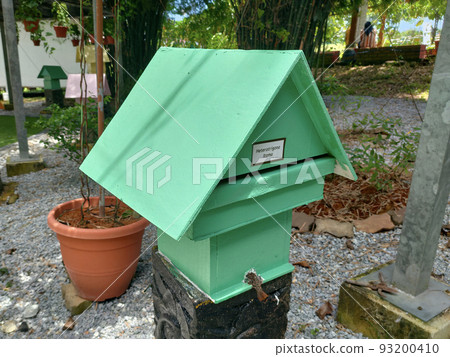 SERDANG, MALAYSIA -JUNE 7, 2022: Heterotrigona Itama or known as Stingless Bee. Man-made nests made of wood and colored colorfully to look attractive. it is farmed to get its honey. 93200410